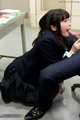 Licking tutors cock kneeling in classroom wearing uniform