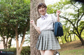 Wakatsuki maria in park wearing uniform in pleated skirt