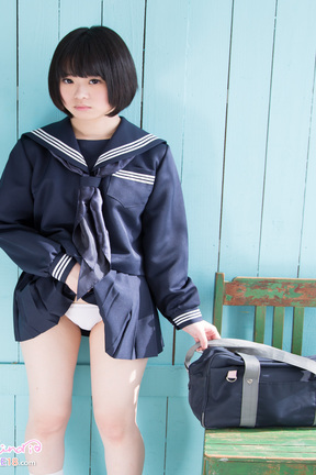Minori stripping her uniform and posing nude on chair