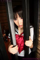 Kogal mizushima ai standing behind bars
