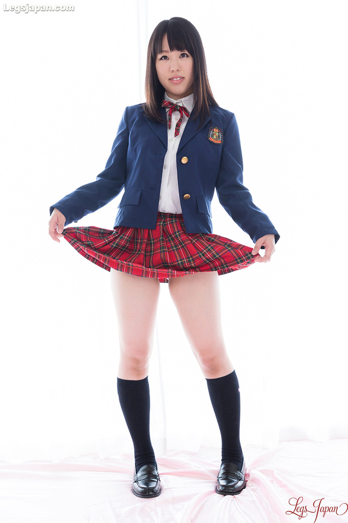 Yuka shirayuki lifting hem of plaid skirt wearing socks
