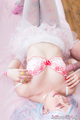 Minano ai lying on her back knees drawn up cum on her breasts wearing bra