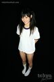 Kawai anri in gym class uniform hands behind her back long hair in pigtails