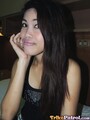 Rhian in black top long hair