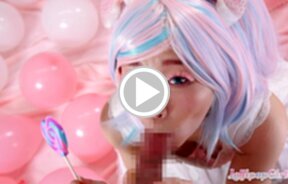 Minano Ai on her knees licking lollipop and sucking cock